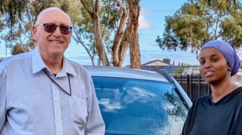 Volunteer Dave Reynolds and one of his students
